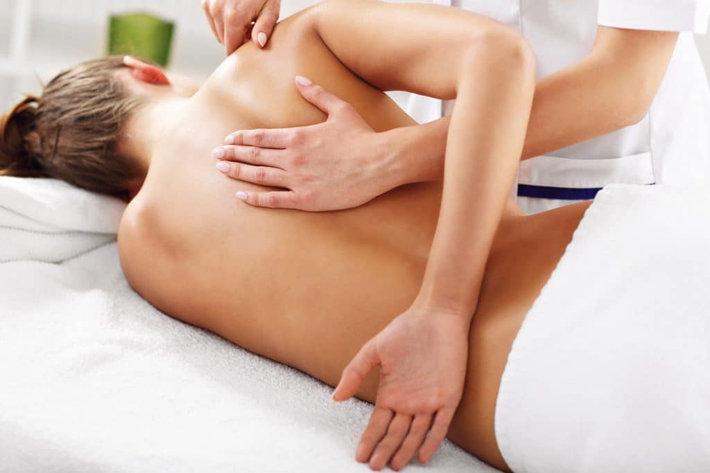 Woman receiving remedial massage
