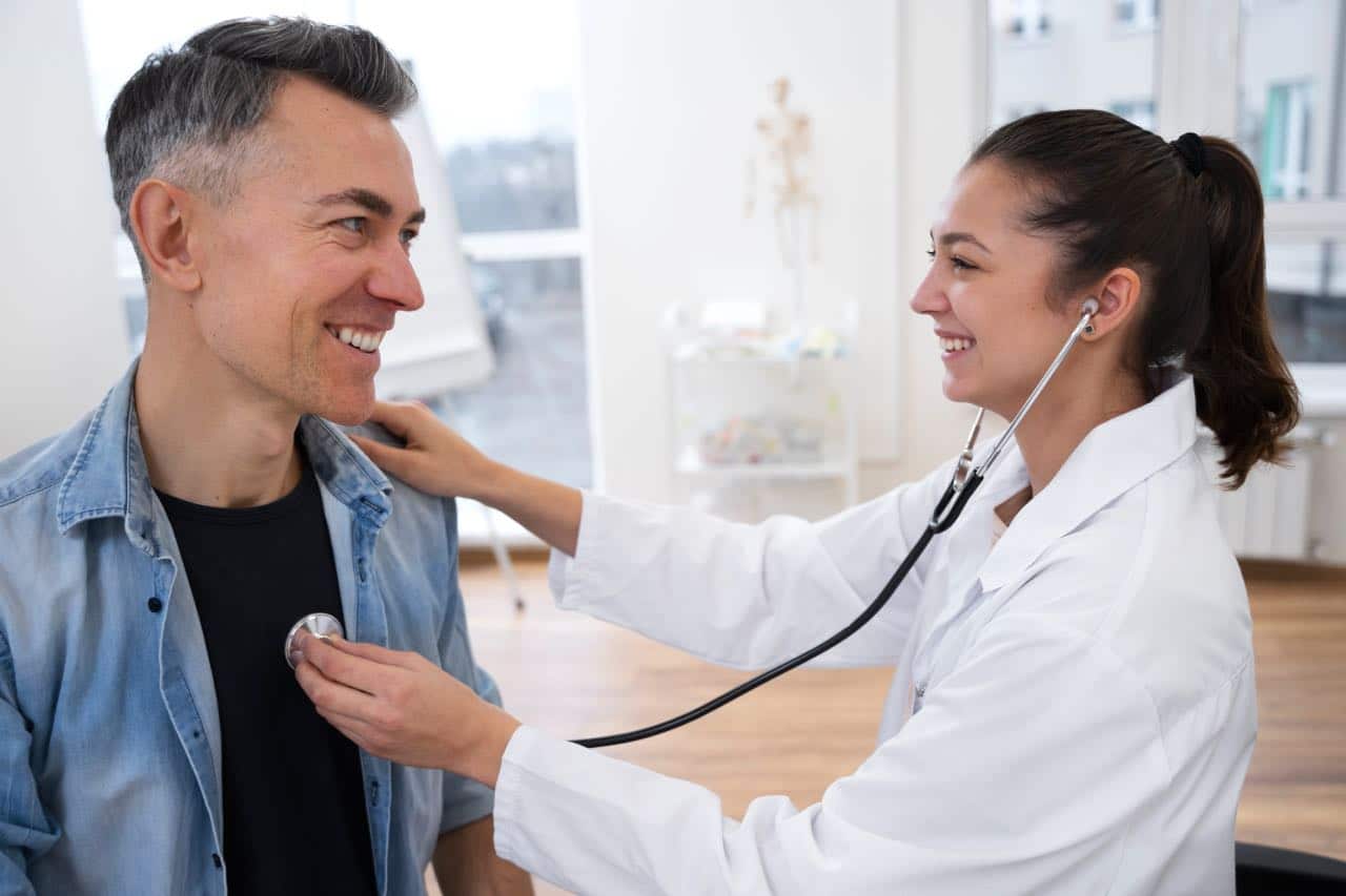 Man receiving health check by a doctor
